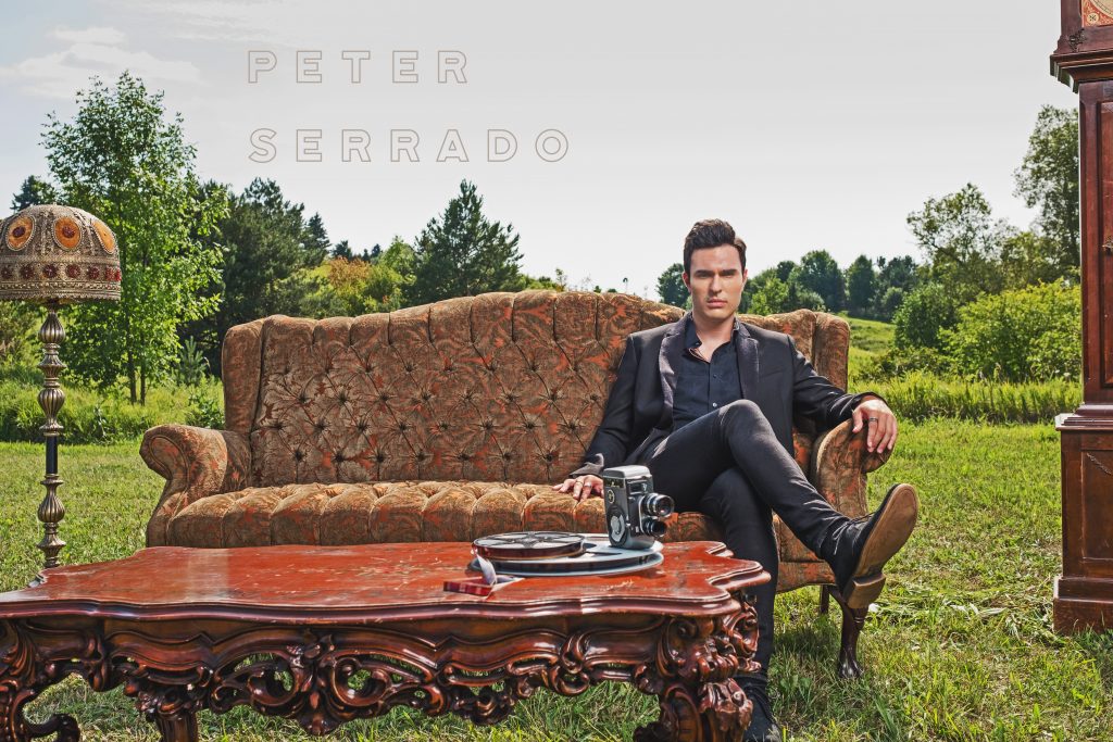 Peter Serrado on sofa